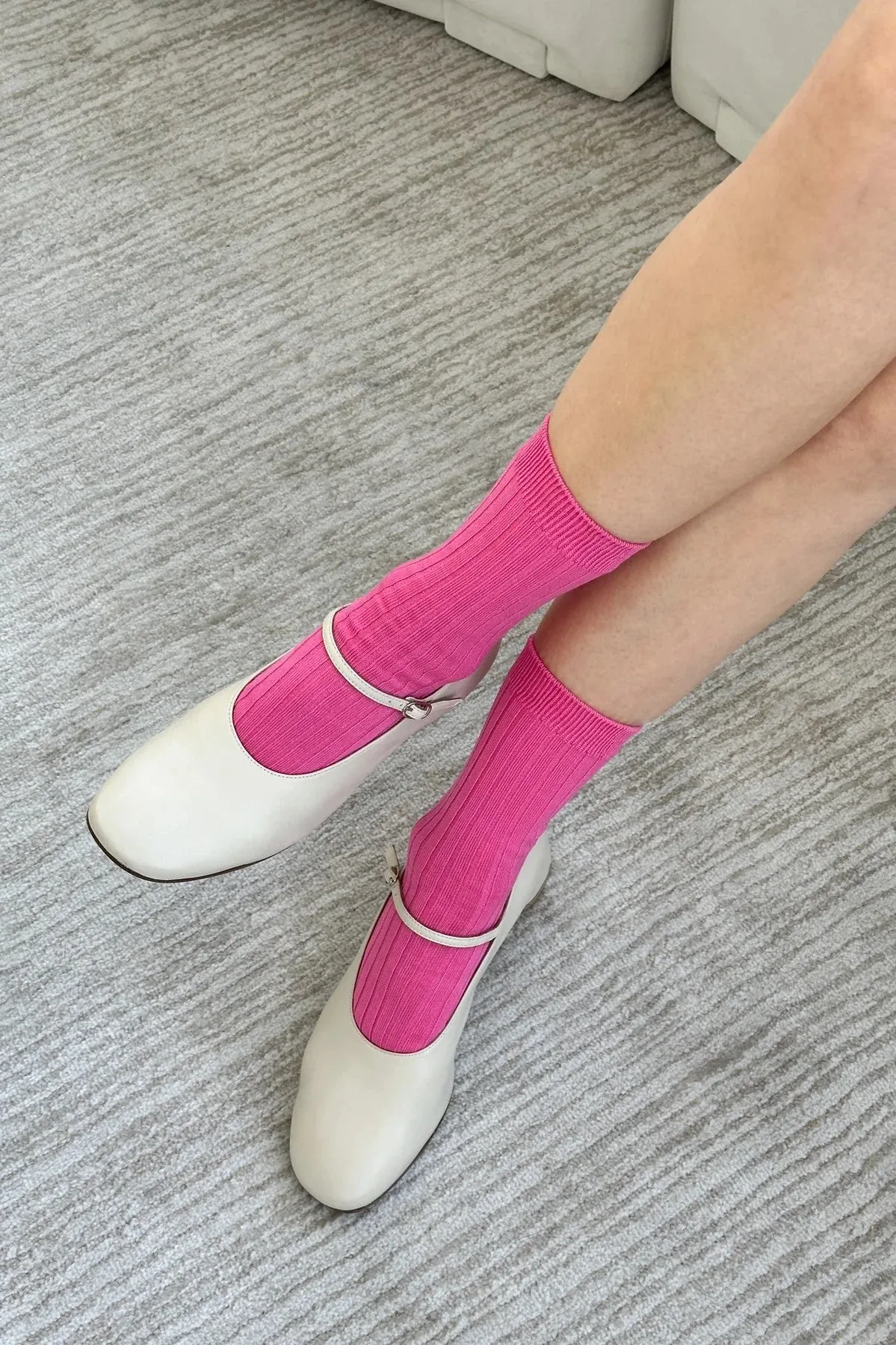 Her Socks in Bright Pink